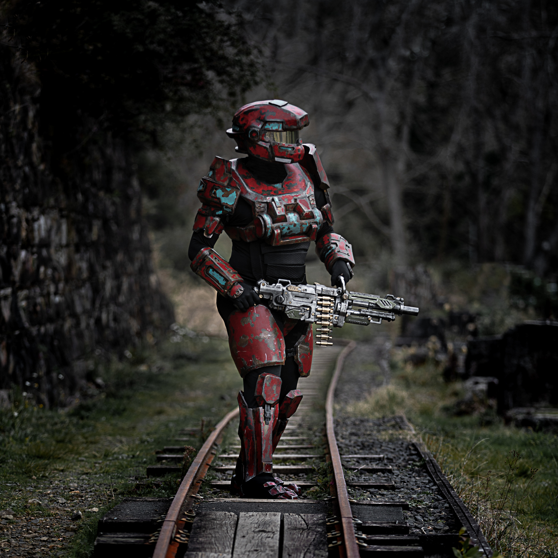 Halo cosply soilder walking the railway tracks