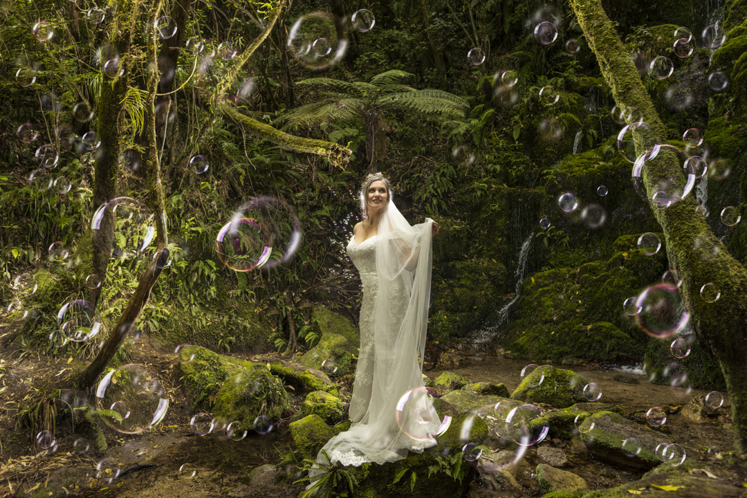Bubbles surround bride in a Bush Wedding-3
